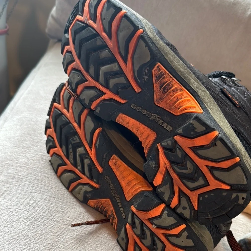 Rugged Black and Orange Boots for Outdoor Adventures